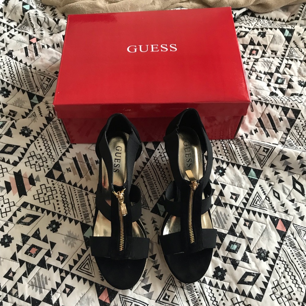 Black and gold guess wedges
